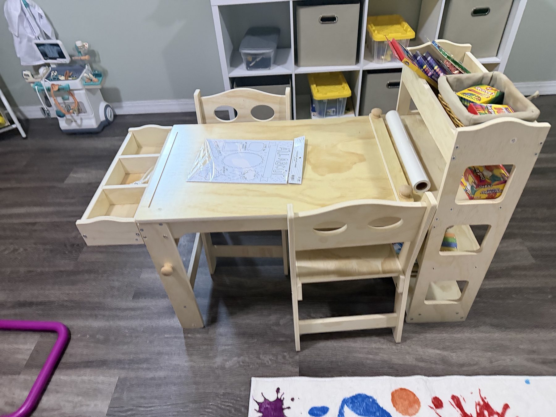 Child-sized learning table and activity materials